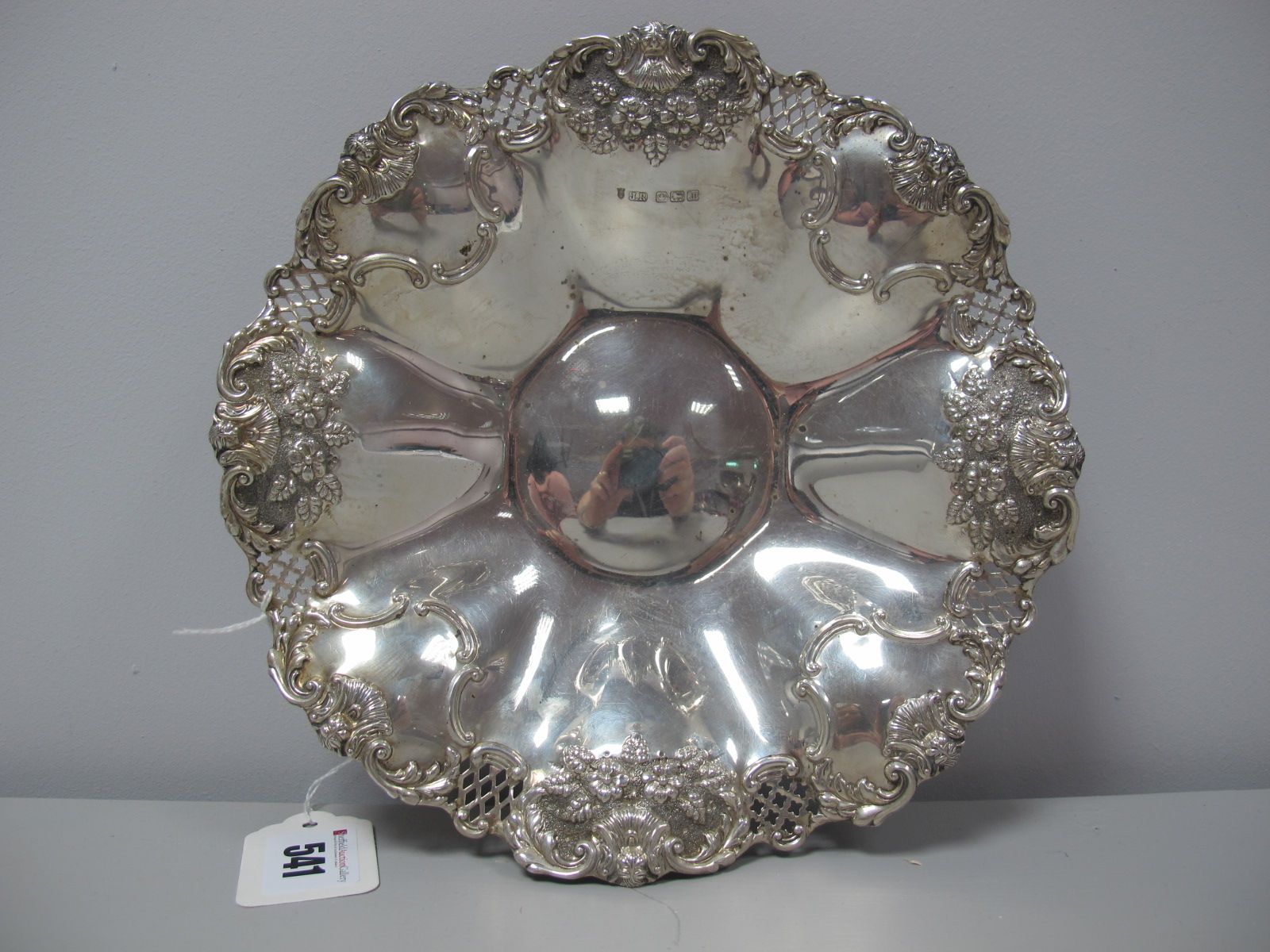 A Hallmarked Silver Dish, JR, Sheffield 1914, of wavy circular form within pierced border, 21cm