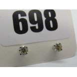 A Pair of 18ct White Gold Single Stone Diamond Earstuds, each brilliant cut stone four claw set.