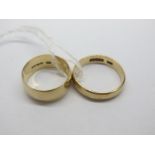 A 9ct Gold Wide Plain Wedding Band, together with another 9ct gold wedding band. (2)