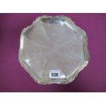 A Hallmarked Silver Dish, EV, Sheffield 1940, of octagonal form with wavy cut edge, raised on four