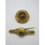 A XIX Century Brooch, of circular form with star detail to the centre, within textured border, the