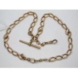 A 9ct Gold Elongated Curb Link Double Albert Chain, to double swivel clasps, suspending T-bar and