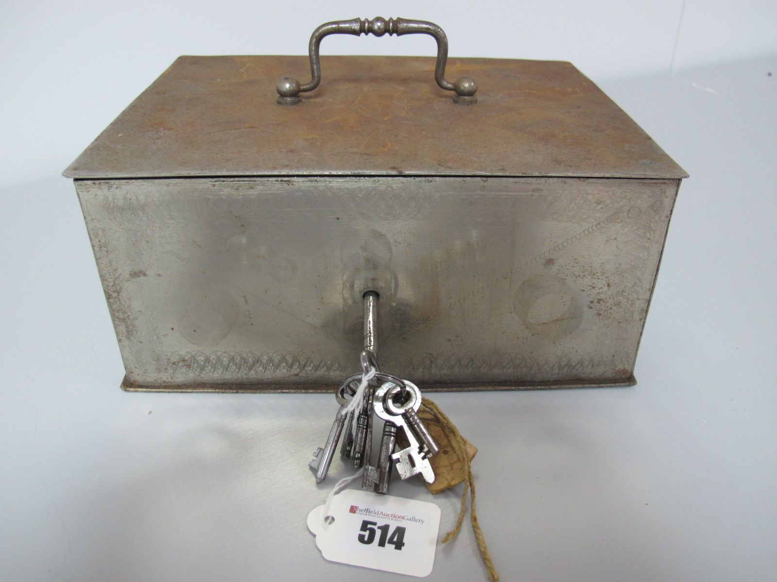 A Metal Strong Box, with top swing carry handle, complete with key.