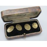 A Pair of 9ct Gold Gent's Cufflinks, the oval panels on chain connections, in a fitted case.