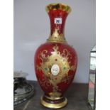 A Bohemian Type Large Baluster Glass Vase, with gilt decoration and applied oval plaques and stones.