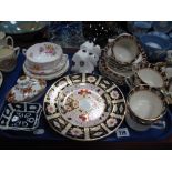 Two Royal Crown Derby Paperweights, modelled as snakes in white with black motifs (one first quality