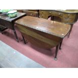 A Mid XVIII Century Mahogany Table, with drop leaves, on pad feet.