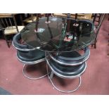 A Set of Four 1960's Heal's Style Chrome Open Armchairs; together with an Arkana style table, with