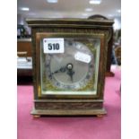 An Elliot Clock Retailed By 'Burrel Sheffield', in an oak case, Roman numeral silvered dial on brass