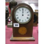 An Edwardian Mahogany Inlaid Mantel Clock, the Roman numeral circular dial with batwing inlay, on