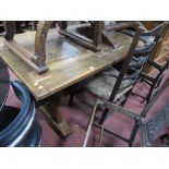 A XX Century Refectory Table, with a rectangular top, baton ends, with trestle supports, centre