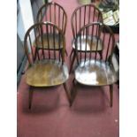 A Set of XX Century Ercol Dining Chairs, with a hooped back, rail supports, solid seats, splayed