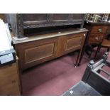 An Edwardian Inlaid Mahogany Box, with panelled top on tapering legs.