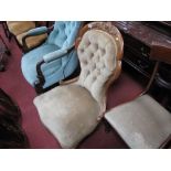 A XIX Century Walnut Spoon Back Nursing Chair, with carved top rail, upholstered button back,