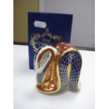 A Royal Crown Derby Paperweight, modelled as a Snake, date code for 1989, gold stopper, boxed.