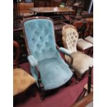 A XIX Century Mahogany Armchair, with upholstered back, sear, arms, on turned forefront legs.