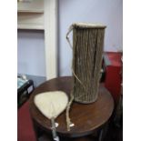 African Cylindrical Shaped Drum, made out of leather, skimwood, together with an African fan made