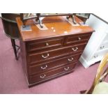 A Chest of Drawers, with two short drawers, three long drawers, bracket feet.
