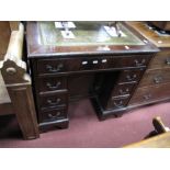 A Mahogany Kneehole Desk, with a crossbanded top, green leather insert, long drawer flanking