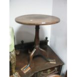 A George III Oak and Elm Snap Top Tripod Table, circular top on ring turned slender baluster column,