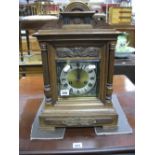 A Late XIX Century German Mantel Clock, with arched top and silvered chapter ring, Roman numerals,