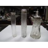 A Part Hallmarked Silver Topped Glass Sugar Sifter; together with two travelling jars. (3)