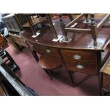 A Late XVIII Century Bow Fronted Sideboard, the crossbanded top with boxwood stringing, central