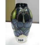 A Moorcroft Pottery Vase in the 'Cherries' Pattern From the Mediterranean Collection by Kerry