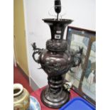 A XX Century Bronzed Effect Table Lamp, of ovoid form, decorated in the oriental style with