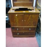 A XIX Century Mahogany Commode, with two cupboard doors over dummy drawers, on bracket feet.