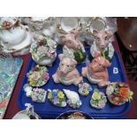 Four Nat West Pigs, Adderley, Doulton and other pottery posies:- One Tray