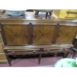 A 1930's Mahogany Sideboard, with three doors and twin drawers all having bakelite handles, on