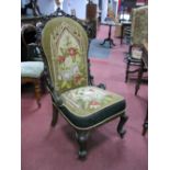 A XIX Century Walnut Chair, with a carved top rail and side with 'C' scroll decoration, with a