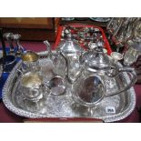 An Electroplated Four Piece Tea Service, of baluster form, with engraved decoration of foliage, lion
