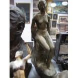 John Friend, 1937 Plaster Figure of a Nude, sat on a rocky plinth, signed on base.