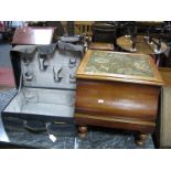 A XIX Century Mahogany Commode, on turned legs. A leather suitcase having canvas cover. (2)