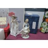 Lladro Pottery 'Afternoon Promenade', of seated lady and dog, both with parasols and two boxes.