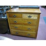 An Edwardian Satin Walnut Chest of Drawers, two short drawers, three long drawers, reeded sides.