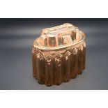 A Victorian Oval Copper Jelly Mould, with fluted panels and upper tier, impressed "CM 192½" and "2",