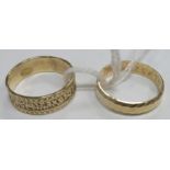 Two 9ct Gold Patterned Wedding Bands. (2)