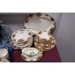 A Royal Albert 'Old Country Roses' Oval Meat Plate, two lidded tureens (one cracked), pepperette,