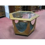 A XX Century Teak Hexagonal Shaped Coffee Table, with a glass top.