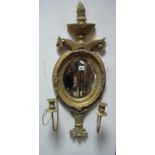 XVIII Century Gessso Style Consul Mirror, with oval mirror, candle sconces,(Damages).