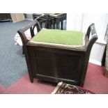 A 1920's Box Seat Piano Stool, containing sheet Music.