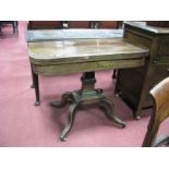 A Regency Rosewood Fold Over Tea Table, with curved corners, brass inlay, shaped pedestal on four