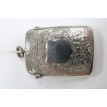 A Hallmarked Silver Vesta Case, WHW, Sheffield 1898, allover leaf scroll engraved, with vacant