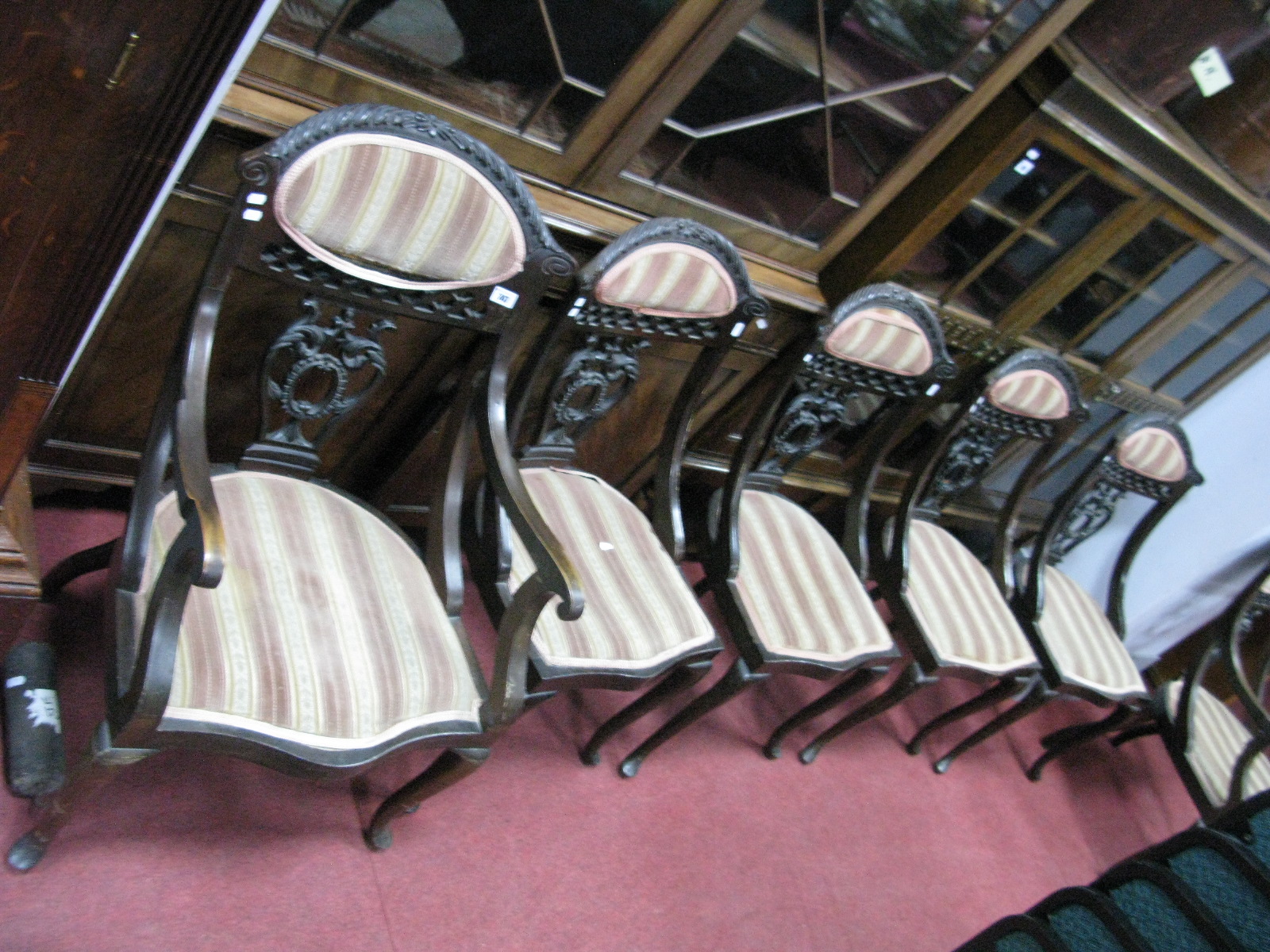 A Pair of Early XX Century Parlour Armchairs and Four Latching Single Chairs, having Scroll curved