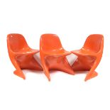 Casalino: Three 1970's Vintage Stackable Space Age Orange Plastic Chairs, designed by Alexander