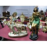 An Art Deco Soft Metal Figurine Group of Lady with Dogs, another painted plaster figure. (2)