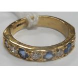 An 18ct Gold Sapphire and Diamond Half Eternity Style Ring, set throughout with uniform stones.